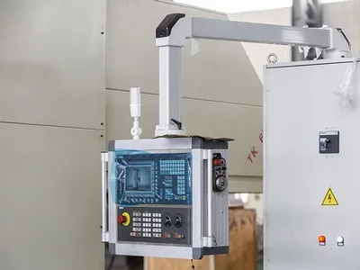 Mandrinadora-fresadora CNC tipo pórtico (pórtico móvil y mesa fija)